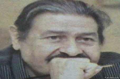  رسام الكاريكاتير مصطفى حسين.