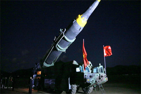 North Korean leader Kim Jong Un inspects the long-range strategic ballistic rocket Hwasong-12