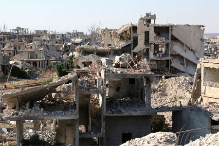 A general view shows damaged buildings in a rebel-held part of the southern city of Deraa, Syria June 22, 2017