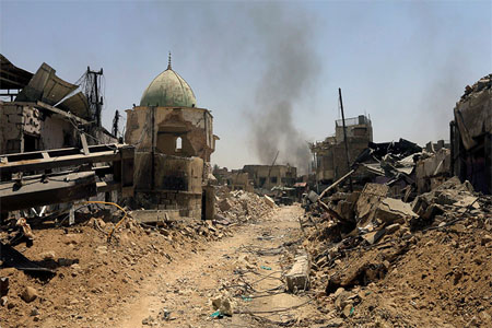 Ruins of the Grand al-Nuri Mosque in the Old City of Mosul, Iraq after it was liberated from Islamic State militants; June 30, 2017