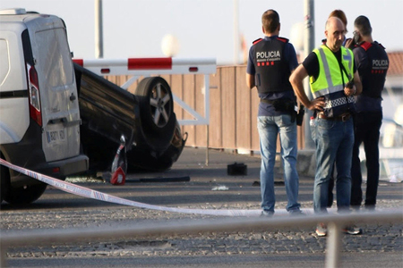 Police investigate at the scene of an attack in Cambrils, south of Barcelona, Spain, August 18, 2017.