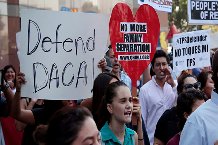 Supporters of the Deferred Action for Childhood Arrivals (DACA) program recipient during a rally outside the Federal Building in Los Angeles, California, U.S., September 1, 2017.