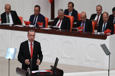 Turkish President Recep Tayyip Erdogan (C)