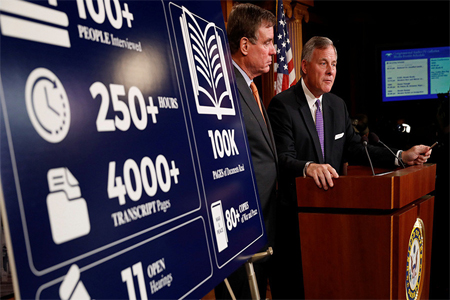 Sen. Richard Burr (R-NC), accompanied by Sen. Mark Warner (D-VA), gives an update on the ongoing investigation into Russian involvement in the 2016 election at the Capitol Building in Washington