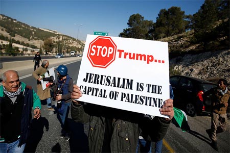 A protest against a promise by U.S. President-elect Donald Trump to re-locate U.S. embassy to Jerusalem, in the West Bank near Jewish settlement of Maale Adumim, January 20, 2017.