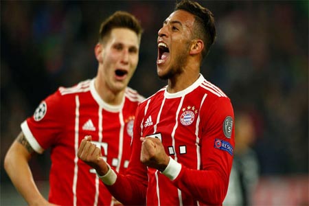 فرحة كورنتان توليسو بعد إحرازه هدفا في مرمى سان جيرمان