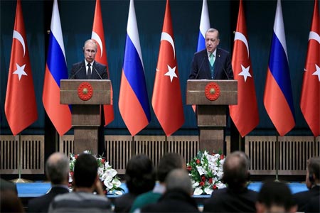 Turkish President Recep Tayyip Erdogan (R) holding a joint press conference with Russian President Vladimir Putin after their meeting at the Presidential Complex.