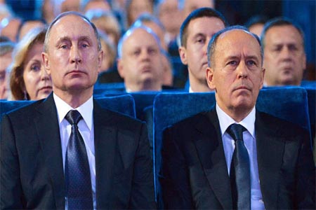 الرئيس الروسي فلاديمير بوتين ورئيس هيئة الأمن الفدرالية ألكسندر بورتنيكوف