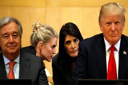 US Ambassador to the UN Nikki Haley (2nd R) receives information, as U.S. President Donald Trump and UN Secretary General Antonio Guterres participate in a session on reforming the United Nations at UN Headquarters in New York, U.S., September 18, 2017.