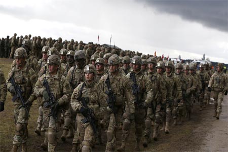 U.S. soldiers attend welcoming ceremony for U.S.-led NATO troops at polygon near Orzysz, Poland, April 13, 2017.