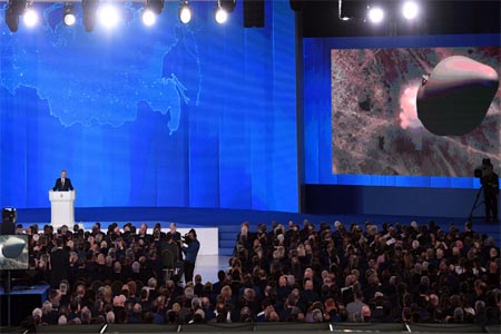 Russian President Vladimir Putin delivers his annual Presidential Address to the Federal Assembly at the Manezh Central Exhibition Hall