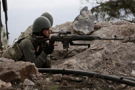 Turkish forces are seen at Mount Barsaya in northeast of Afrin, Syria January 28, 2018.
