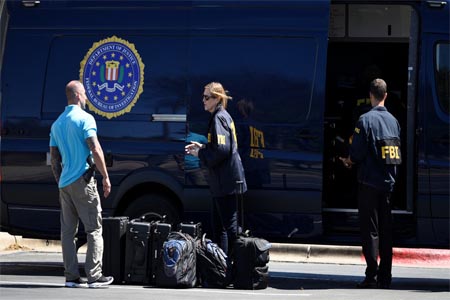 Law enforcement personnel are seen in Austin, Texas on March 20, 2018