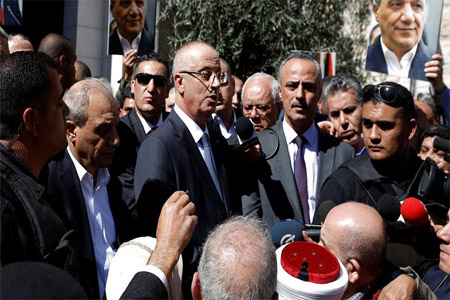 Palestinian Prime Minister Rami Hamdallah speaks after he survived an assassination attempt in Gaza, at his office in the Ramallah, in the occupied West Bank.