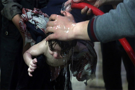 A photo showing a child being washed after what the White Helmets and other anti-government groups in Syria claim was a chemical weapons attack in Douma, Eastern Ghouta, on April 7. The Russian military says the photos were staged.
