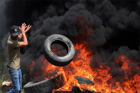 من مواجهات كفر قدوم، عدسة جعفر اشتية