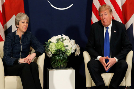 US President Donald Trump meets with Britain's Prime Minister Theresa May during the World Economic Forum (WEF) annual meeting in Davos, Switzerland January 25, 2018.