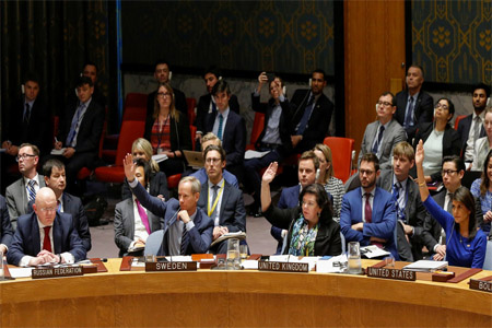 Russian Ambassador to the United Nations Vasily Nebenzya, watches members of the UN Security Council vote against a Russian resolution condemning 'aggression' against Syria.