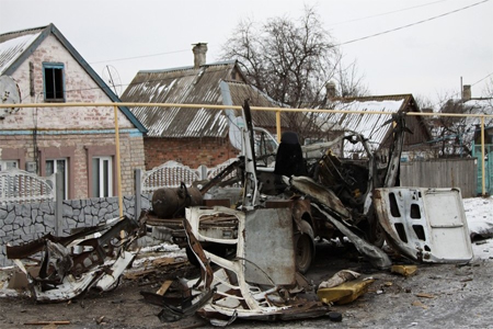 A light truck destroyed by a shooting in Dokuchayevsk, Donetsk Region