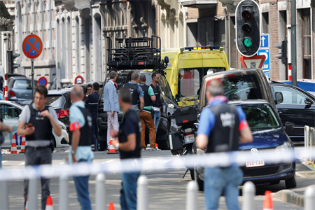 Police officers are seen on the scene of a shooting in Liege, Belgium, May 29, 2018.