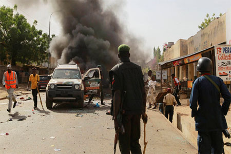 People gather to help at the scene of a bomb explosion in Gombe. (File photo: Reuters)