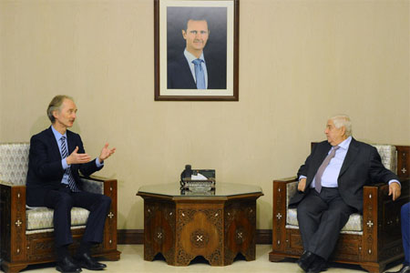 Syrian Foreign Minister Walid Muallem (R) met with UN Special Envoy to Syria Geir Pedersen in the capital Damascus. (AFP)