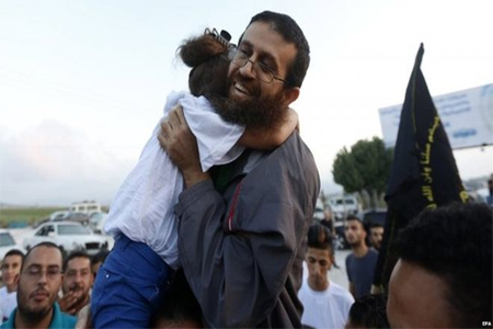  Khader Adnan was reunited with his family after leaving the Israeli prison