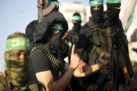 Palestinian Hamas militants take part in an anti-Israel military parade in Gaza