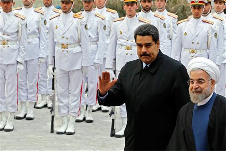 روحاني خلال استقباله مادورو في طهران، اليوم (أ ب أ)