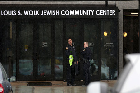 Police search a Jewish Community Center after a bomb threat was reported in the Rochester suburb of Brighton, New York, U.S., March 7, 2017.