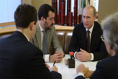 Russian President Vladimir Putin meeting the head of the Lega Nord party, Matteo Salvini, at the ASEM forum.