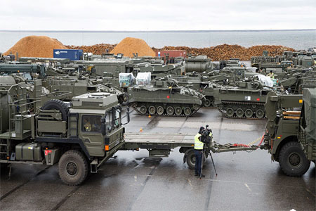 British tanks and military vehicles are unloaded at the port Estonian of Paldiski on March 22, 2017.