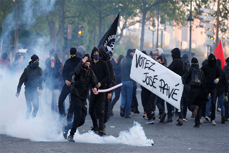 Demonstrators clash with French riot police in Paris, France April 23, 2017